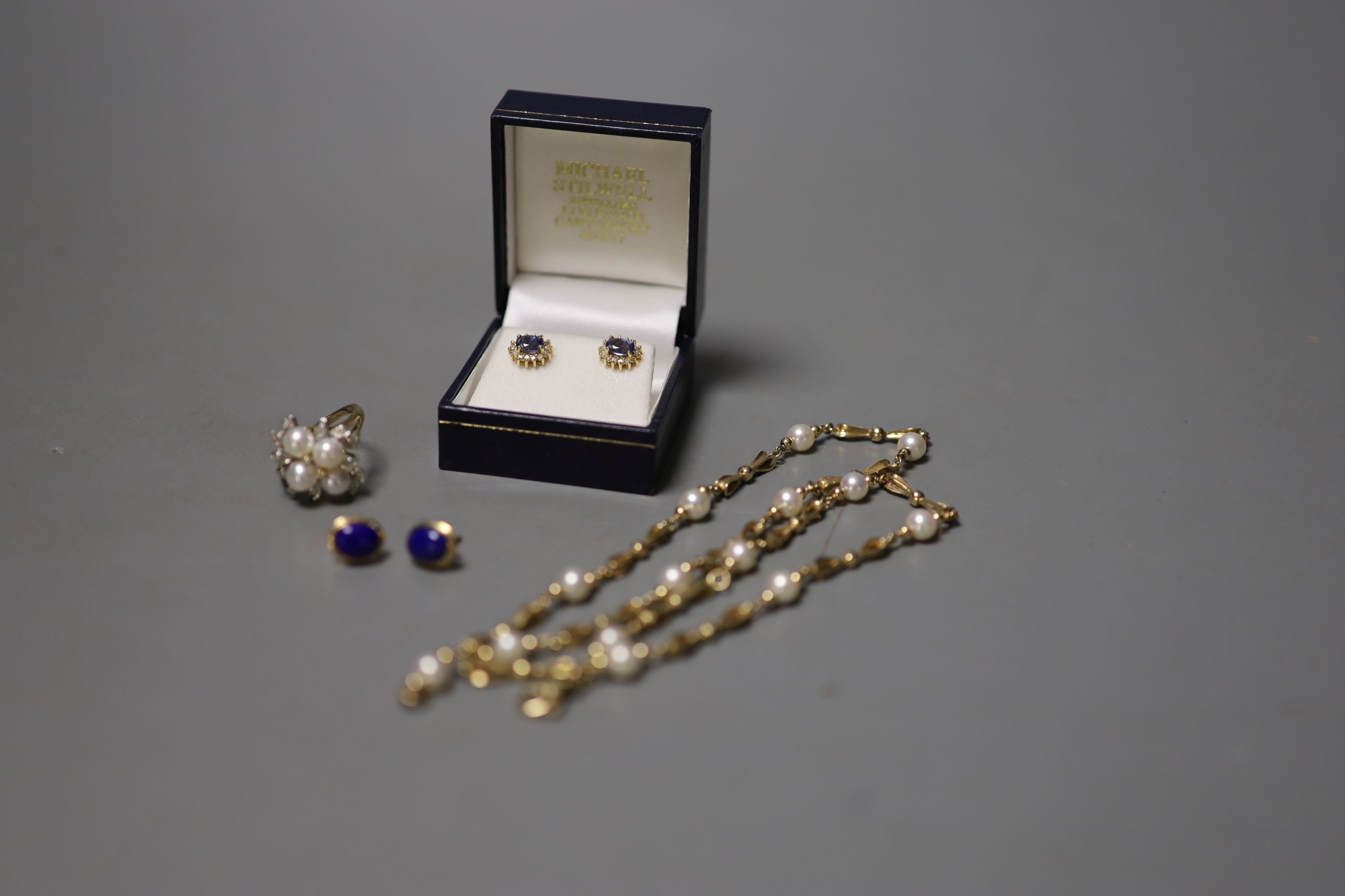 A pair of 9ct and lapis lazuli ear studs, a 9ct and cultured pearl necklace, gross 18.9 grams, a pair of 750, sapphire and diamond set oval ear studs, a 9ct dress rings and a quantity of assorted costume jewellery.